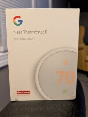 Google Nest Thermostat E — white packaging with blue, red, yellow and green dots